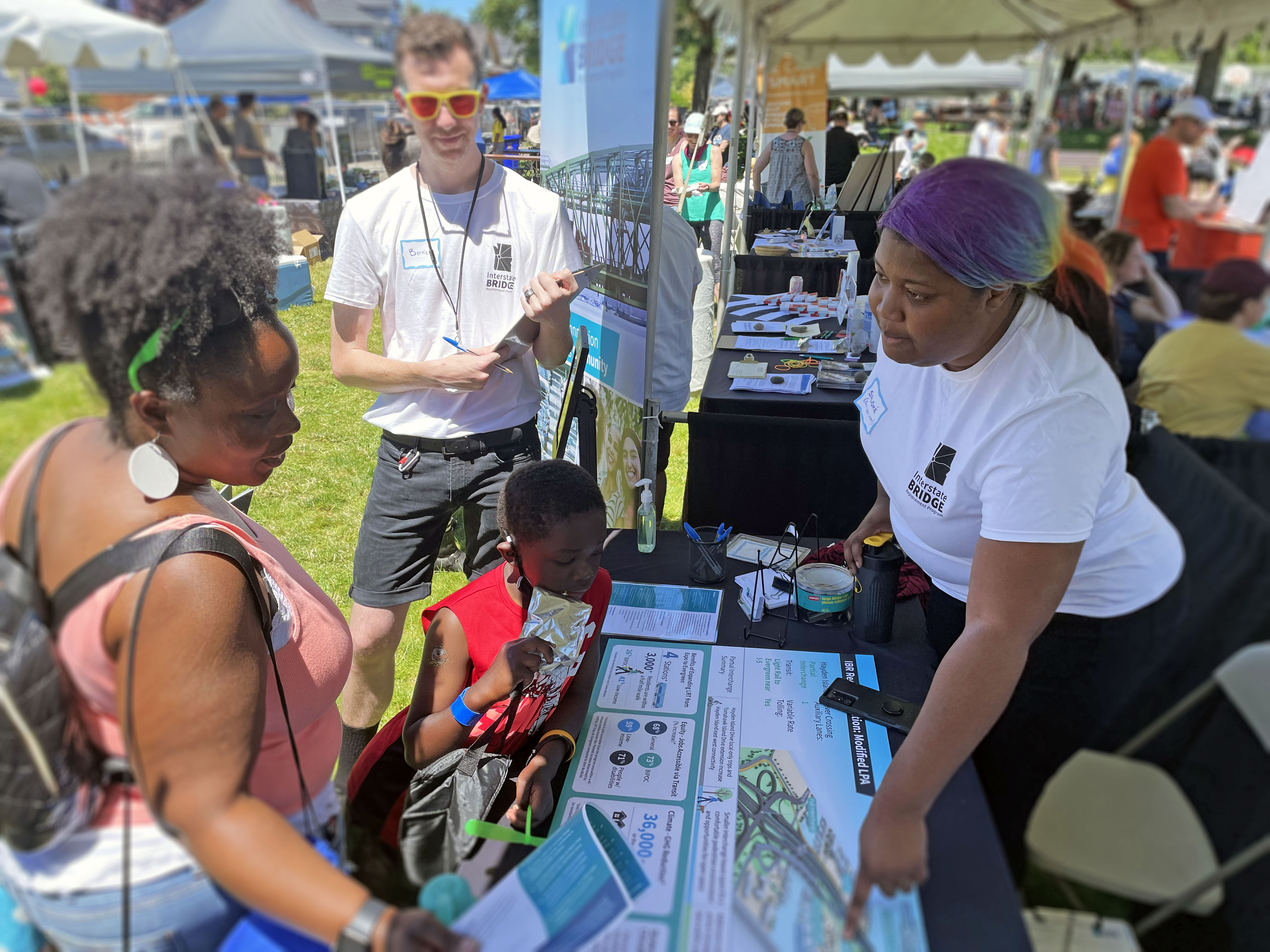 Picture of IBR reaching out to the community during the Good in the Hood Festival.